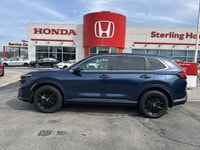 The 2024 Honda CR-V Hybrid EX-L in stunning Canyon River Blue Metallic offers an unparalleled blend... (image 7)