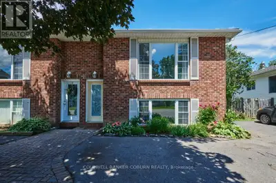 LOCATION CONVENIENCE LIFESTYLE - Welcome to this charming semi-detached home at 50B Fifth Street Wes...