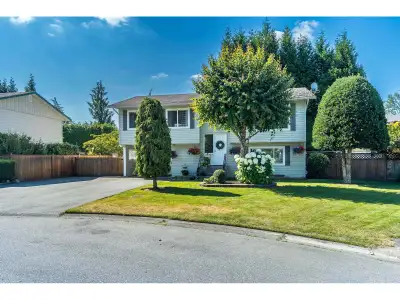 Beautiful split-entry home on quiet cul-de-sac next to Nicomekl Trails, with RV parking! This 4 bed,...