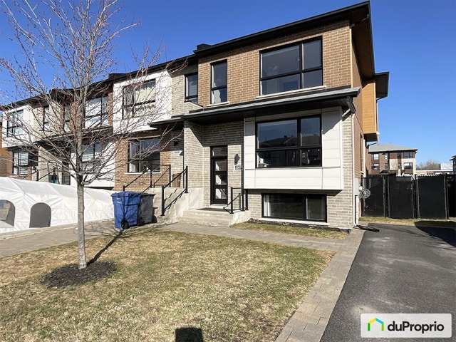 $659,000 - Townhouse for sale in Longueuil (St-Hubert) — photo 1