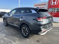 Navigate every journey with unwavering confidence in this exceptional 2023 Kia Sportage LX Sport Uti... (image 6)