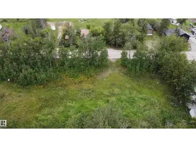 Lac Ste Anne lakeview .27 acre property just across the road from the shoreline! Central area is cle...