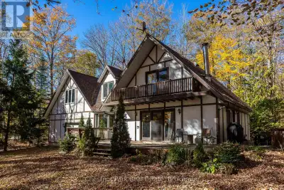 This charming Tudor-style, four-season home or cottage sits on a serene 2.3-acre hardwood lot, just...