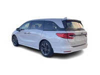 Our 2023 Honda Odyssey Touring in Platinum White Pearl is in stock and all up to date on maintenance... (image 6)
