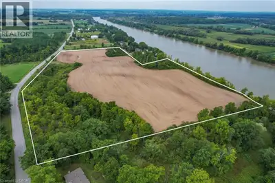 Truly Irreplaceable, Rarely offered 19.85 acre coveted Grand River Waterfront Building Lot on sought...