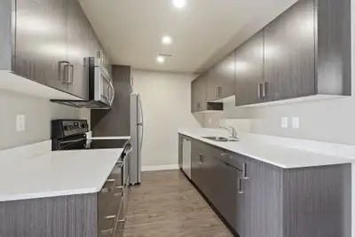 Amenities: In-suite Laundry • Security Cameras • Single or Double Car Garages Suite & Building: Two-...
