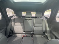 Experience the luxury of driving a black 2023 BMW X1 xDrive28i Sports Activity Vehicle with its comp... (image 9)