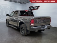 The 2022 Ram 1500 Classic Warlock 4x4 Crew Cab 57 Box blends rugged capability with bold style and e... (image 6)