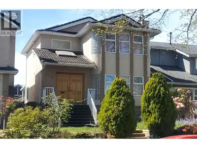 Welcome to this Marpole family home offering a functional 3-level layout and over 2,200 square ft of...