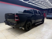 The 2019 Ram 1500 Sport 4x4 Quad Cab in a majestic black on black configuration exemplifies power, s... (image 6)