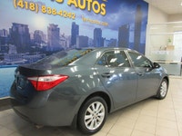 TOYOTA COROLLA 2016 AUTOMATIQUE / AIR-CLIMATISÉ / BLUETOOTH AVEC 134 600 KM CERTIFIÉ ( RAPPORT CARFA... (image 5)