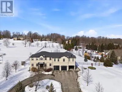 Magnificent executive estate set on approximately 1.5 acres of beautifully landscaped grounds. This...