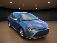 The 2021 Toyota Corolla LE in sleek gray with its reliable front-wheel drive and automatic transmiss... (image 3)