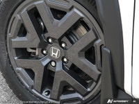 The 2026 Honda CR-V Hybrid TrailSport AWD in a stunning white finish offers unmatched versatility wi... (image 8)