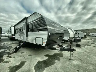 EAST TO WEST Della Terra travel trailer 200RD highlights: Full Bathroom Bar Top w/ Stools Jiffy Sofa...