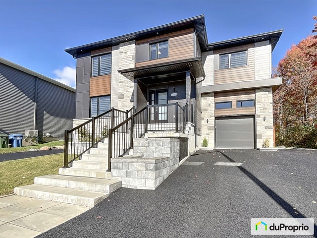 $1,050,000 - 2 Storey in Charlesbourg (ND-Des-Laurentides) — photo 1