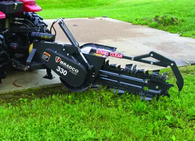 Bradco 330 Trenchers requires rear hydraulics to run the machine. Comes with light/medium duty boom...