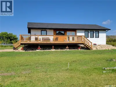 Where does Katepwa Lake access, expansive valley and lake views, and a spacious move in ready home m...