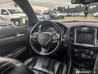 This Chrysler 300 delivers a Regular Unleaded V-6 3.6 L/220 engine powering this Automatic transmiss... (image 8)