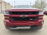 AMVIC Licensed Dealer This 2018 Chevrolet Silverado 1500 2LT is finished in striking Cajun Red Tintc... (image 1)