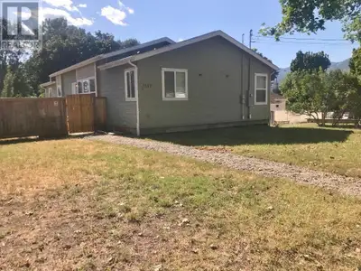 Excellent two way opportunity, this three unit property contains a three bedroom home on the main wi...