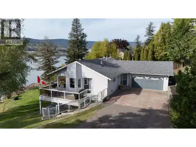 Visit REALTOR website for additional information. LAKEFRONT ELEGANCE & UNFORGETTABLE VIEWS! Discover...
