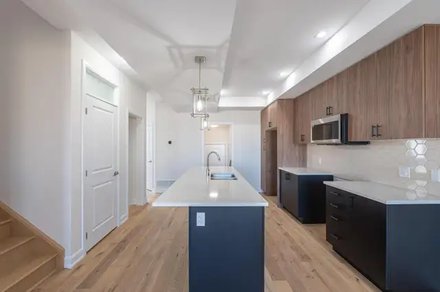 Beautiful, brand new 4 bed 3.5 bath upper unit