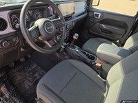 This Jeep Wrangler has a strong Regular Unleaded V-6 3.6 L/220 engine powering this Manual transmiss... (image 6)