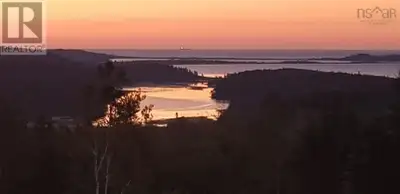 Escape to the breathtaking Atlantic coast of Nova Scotia with this extraordinary 30-acre (1,306,800...