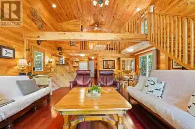 Cottage life! Lake life! Imagine a chalet style cottage nestled amongst the trees in a private subdi...