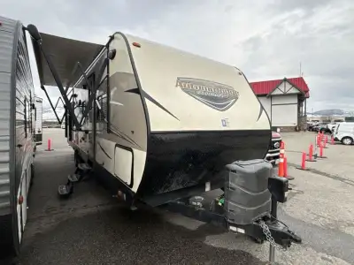 Sleeping space for seven people, a single slide out, plus an outdoor kitchen makes camping in the Au...