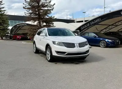 The 2016 MKX Reserve is characterized by its "Split-wing" front grille and a full-width LED taillamp...