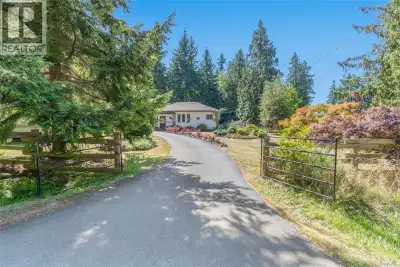 Charming rancher on a 1/2 acre in a rural setting near Deep Bay. Enjoy tranquility in this bright 1...