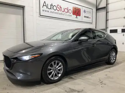 La Mazda Mazda3 Sport GT 2021 usagée proposée par AutoStudio 72 à Mirabel affiche 98 862 km et une p...