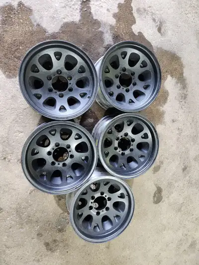 OFF OF A NISSAN PATHFINDER LOOKS LIKE THEY WERE PAINTED / POWDER COATED ORIGINAL NISSAN WHEELS $400