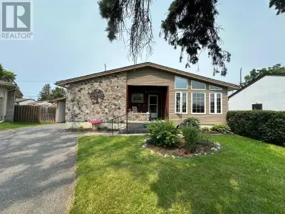 New Listing. Instantly Appealing Bungalow Design Boasts Vaulted Ceilings over Living room and Kitche...