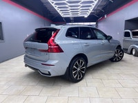 The 2024 Volvo XC60 B5 AWD Plus Dark Theme in a stunning blue finish is engineered for those who dem... (image 5)