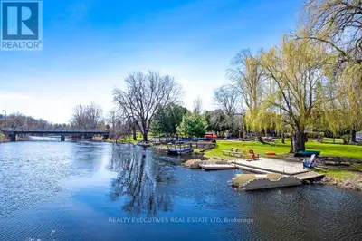 Incredible Opportunity: Water-Sport Business, Residence & 6+ Acres on Tay River in Historic Perth, O...