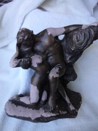 vintage collectable statuette 10"high 6 inches across heavy -