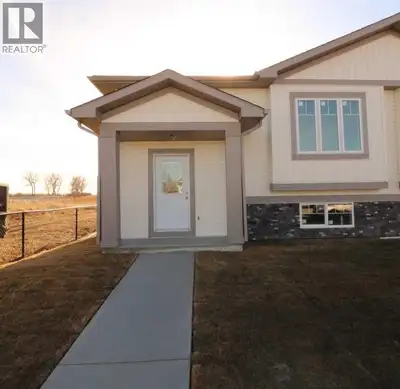 New 1/2 Duplex. 2 bedrooms with potential for more. This open concept design has Main floor laundry,...