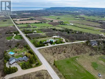 Build your dream home on this unique property that offers panoramic views of Georgian Bay and the Be...