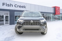 Recognized as an IIHS Top Safety Pick, this 2023 Toyota RAV4 XLE in striking Black is ready for its... (image 1)