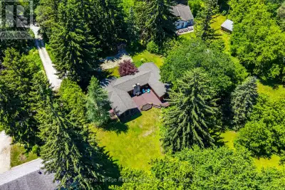 Escape to the tranquility of Glen Williams with this charming Pan-Abode Western Red Cedar log cabin...