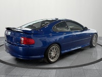 The 2004 Pontiac GTO is one of the last true V8 muscle cars from Pontiac and is quickly becoming a s... (image 5)