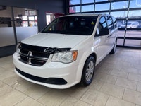 The 2019 Dodge Grand Caravan Canada Value Package in pristine white is the perfect blend of practica... (image 8)