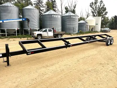 40' Header Trailer, 700FD Mounts. At Central Butte Dealership. Call or Text: Morgan: 306-561-7933. O...