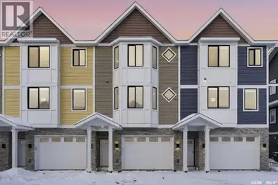 Welcome to 135–3220 11th Street West. A brand new, end unit, contemporary 3-storey townhouse offerin...