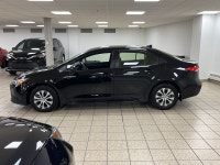 Among compact hybrid sedans, many chase headlines with flash or sheer output; this 2024 Toyota Corol... (image 2)