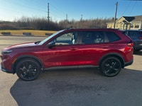 Welcome to Cumberland Honda 2026 Honda CR-V Hybrid Touring Radiant Red Metallic AWD CVT 2.0L 16V DOH... (image 5)