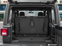 This Jeep Wrangler has a dependable Intercooled Turbo Premium Unleaded I-4 2.0 L/122 engine powering... (image 6)
